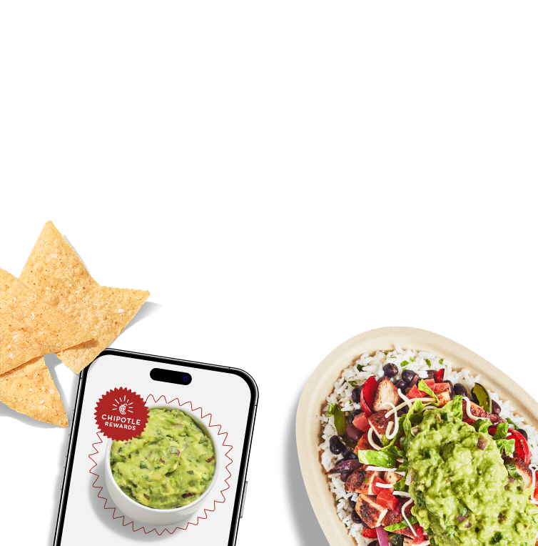 A Chicken Burrito Bowl with White Rice, Black Beans, Fajita Veggies, Fresh Tomato Salsa, Lettuce, and Guacamole with a side of freshly made Tortilla Chips and a side of Guac.
