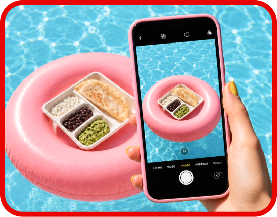 A smart phone taking a photo of the Salish Matter Kid’s Meal in a pink pool floatie.